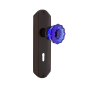 Nostalgic Warehouse Deco Solid Brass Rose Privacy Door Knob Set with Cobalt Crystal Knob and Decorative Keyhole for 2-3/8" Backset Timeless Bronze