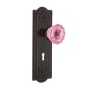 Nostalgic Warehouse Meadows Solid Brass Rose Privacy Door Knob Set with Pink Crystal Door Knob and Decorative Keyhole for 2-3/8" Backset Timeless Bronze