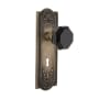 Nostalgic Warehouse Meadows Solid Brass Rose Privacy Door Knob Set with Black Waldorf Door Knob and Decorative Keyhole for 2-3/4" Backset Antique Brass