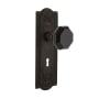 Nostalgic Warehouse Meadows Solid Brass Rose Privacy Door Knob Set with Black Waldorf Door Knob and Decorative Keyhole for 2-3/4" Backset Oil-Rubbed Bronze