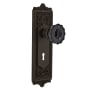 Nostalgic Warehouse Egg and Dart Solid Brass Rose Passage Door Knob Set with Black Crystal Knob and Decorative Keyhole for 2-3/4" Backset Oil-Rubbed Bronze
