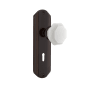 Nostalgic Warehouse Deco Solid Brass Rose Passage Door Knob Set with White Milk Glass Waldorf Knob and Decorative Keyhole for 2-3/8" Backset Timeless Bronze