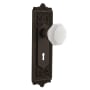 Nostalgic Warehouse Egg & Dart Solid Brass Rose Passage Door Knob Set with White Milk Glass Waldorf Knob and Decorative Keyhole for 2-3/8" Backset Oil-Rubbed Bronze