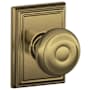 Schlage Georgian Passage Door Knob Set with Decorative Addison Trim Antique Brass