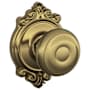 Schlage Georgian Passage Door Knob Set with Decorative Brookshire Trim Antique Brass
