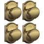 Schlage Plymouth Passage Door Knob Set with Decorative Camelot Trim - Pack of 4 Antique Brass