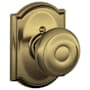 Schlage Georgian Non-Turning One-Sided Dummy Door Knob with the Decorative Camelot Rose Antique Brass