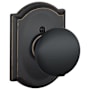 Schlage Plymouth Non-Turning One-Sided Dummy Door Knob with the Decorative Camelot Rose Aged Bronze