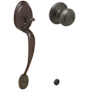Schlage Plymouth Keyed Entry Handleset with a Georgian Interior Knob from the Plymouth Collection Aged Bronze