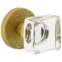 Viaggio Motivo Solid Brass Passage Door Knob Set with Quadrato Crystal Knob and Circolo Leather Rosette - 2-3/8" Backset Satin Brass