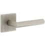 Viaggio Motivo Right Handed Solid Brass Passage Door Lever Set with Moderno Lever and Quadrato Leather Backplate - 2-3/8" Backset Satin Nickel