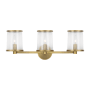 Visual Comfort Reynolds 3 Light 24" Wide Vanity Light with Clear Glass Shades Time Worn Brass