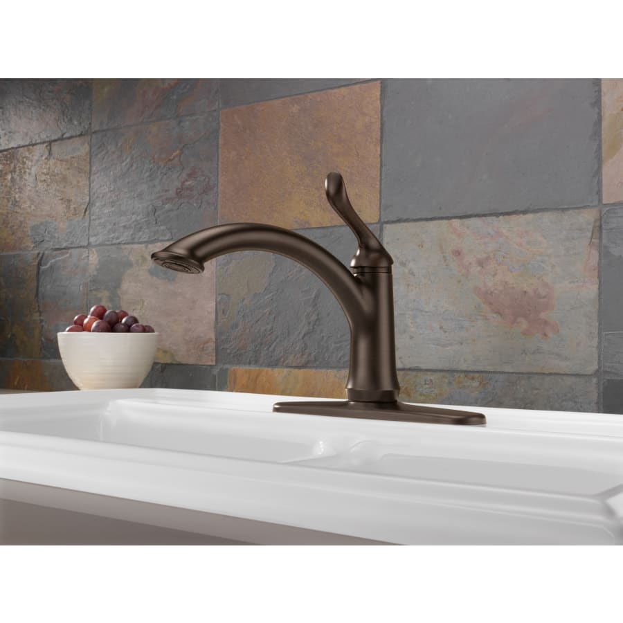 delta-1353-dst-installed-faucet-with-escutcheon-plate-in-venetian-bronze-1854 delta-1353-dst-installed-faucet-with-escutcheon-plate-in-venetian-bronze-1854