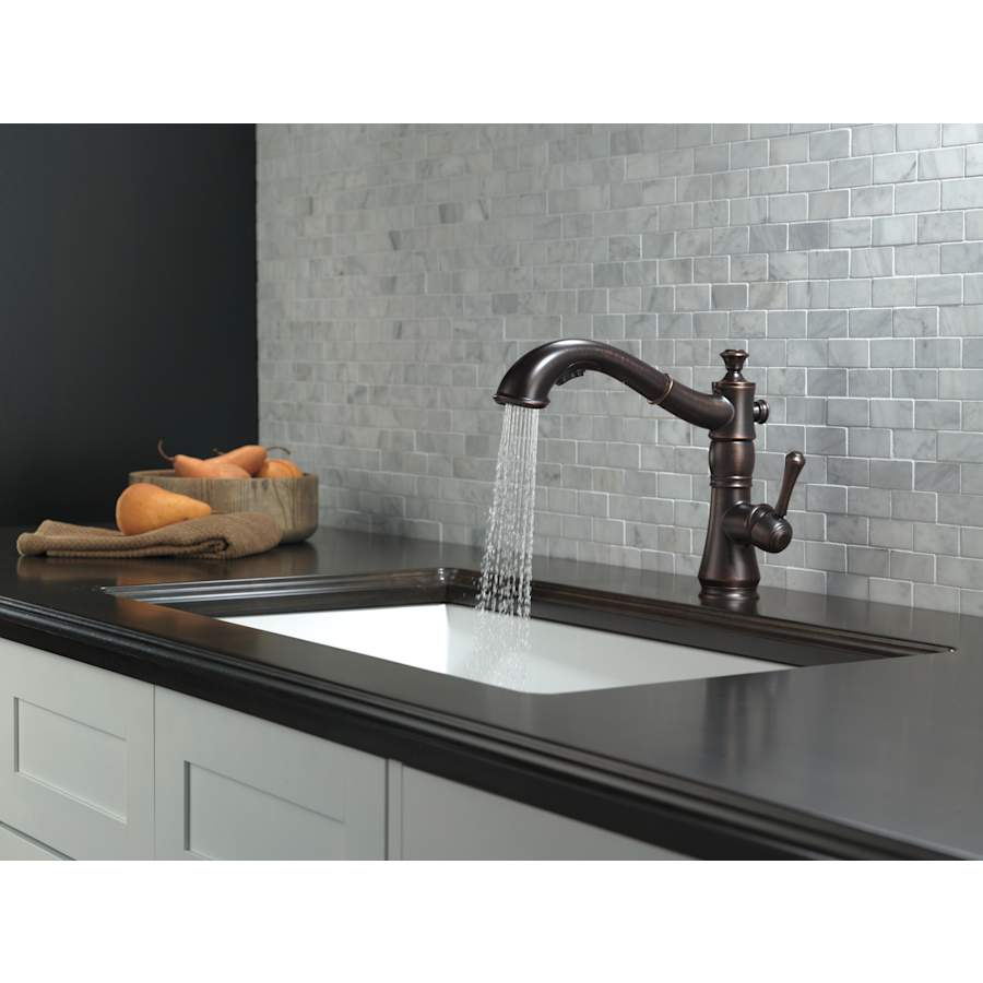 delta-4197-dst-running-faucet-in-spray-mode-in-venetian-bronze-26