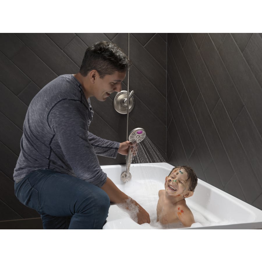 delta-t14038-handshower-in-use-in-brilliance-stainless-470 delta-t14038-handshower-in-use-in-brilliance-stainless-470