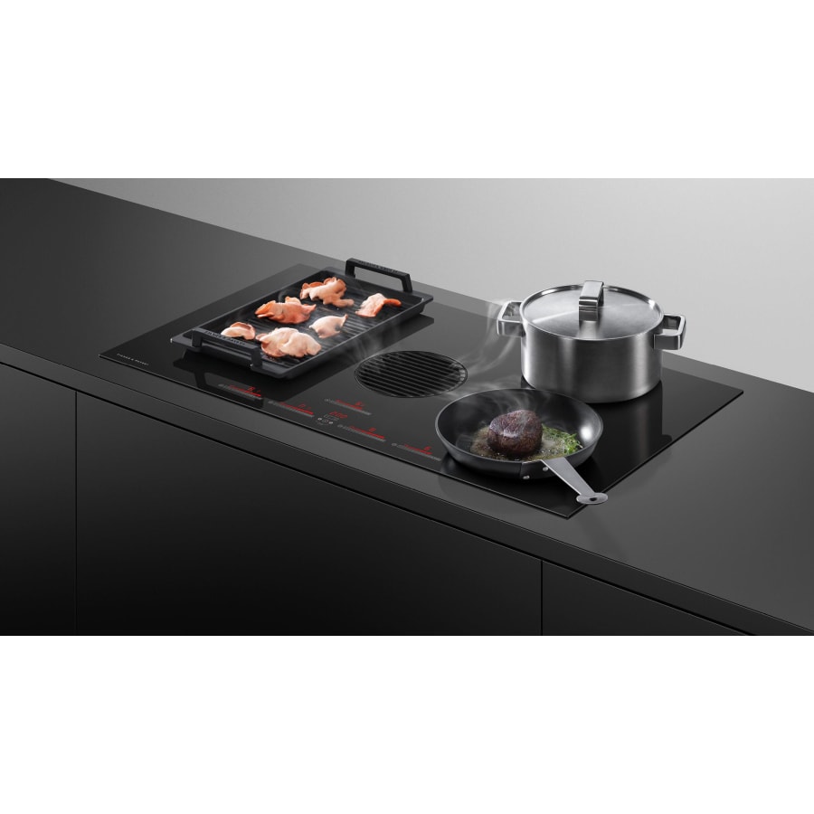 Integrated ventilation cooktop clearance