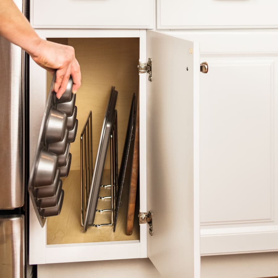 Cabinet divider for cookie sheets clearance