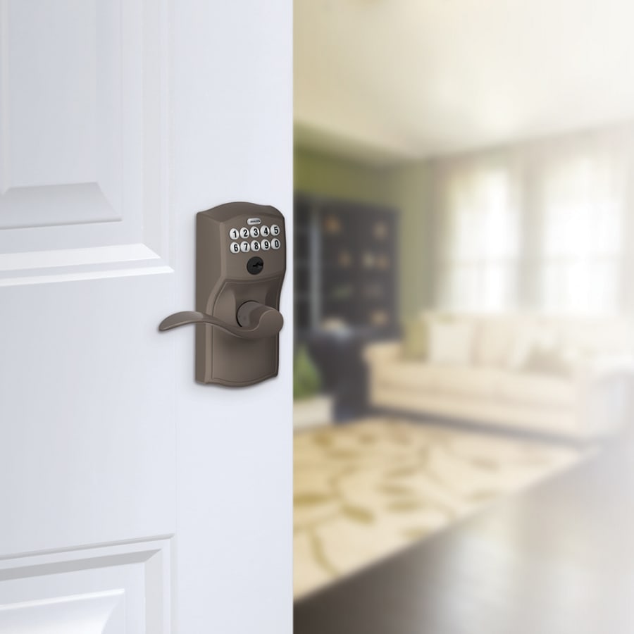 Schlage's FE595-CAM-ACC in Oil Rubbed Bronze on door.