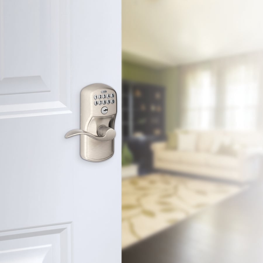 Schlage's FE595-PLY-ACC in Satin Nickel on door.