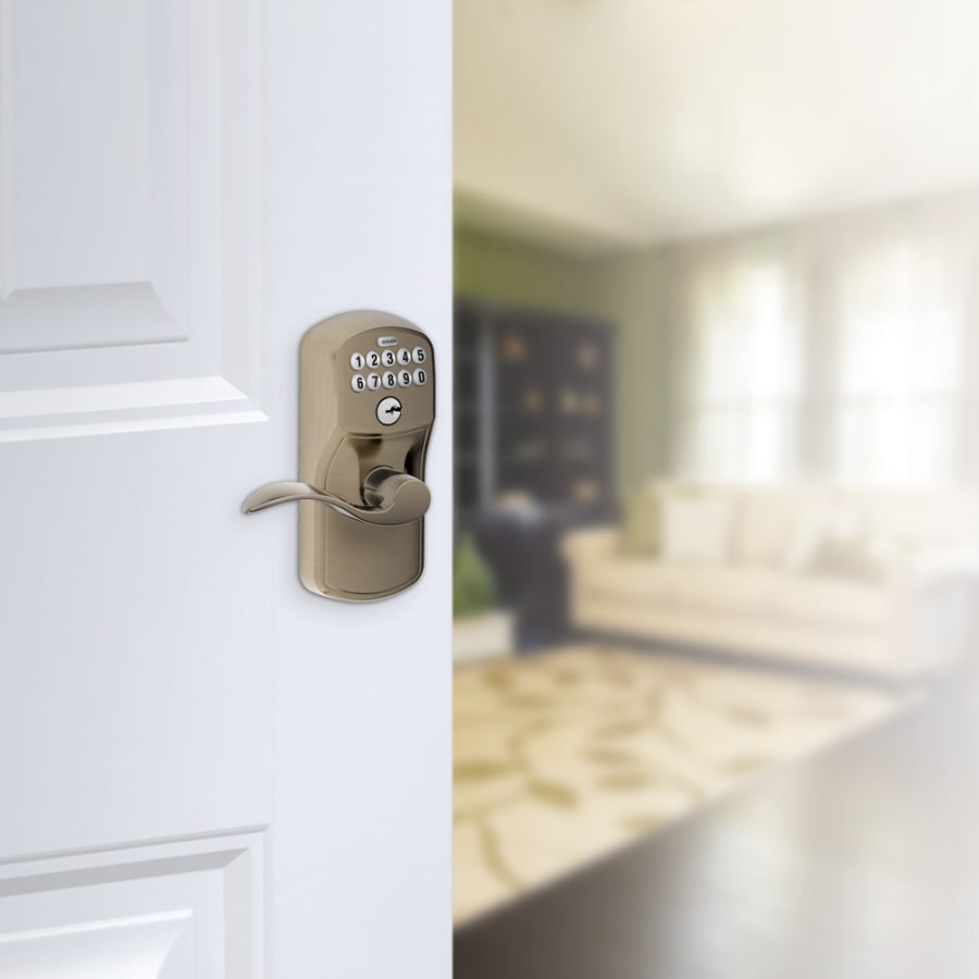Schlage's FE595-PLY-ACC in Antique Pewter on door.