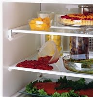 Removable spillproof glass shelves