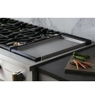 Stainless and Aluminum-Clad Griddle Included