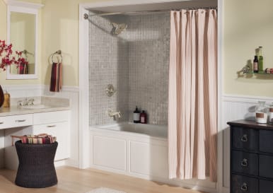 Use Extra Shower Curtain Rods to Increase Bathroom Storage & More