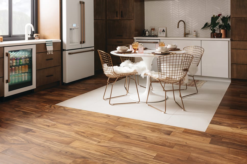 Mid Century modern kitchen with warm engineered hardwood flooring.