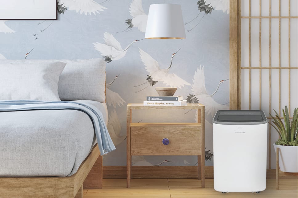 portable air conditioner in organic modern bedroom.